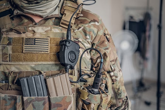 Close up of soldier's radios in vest